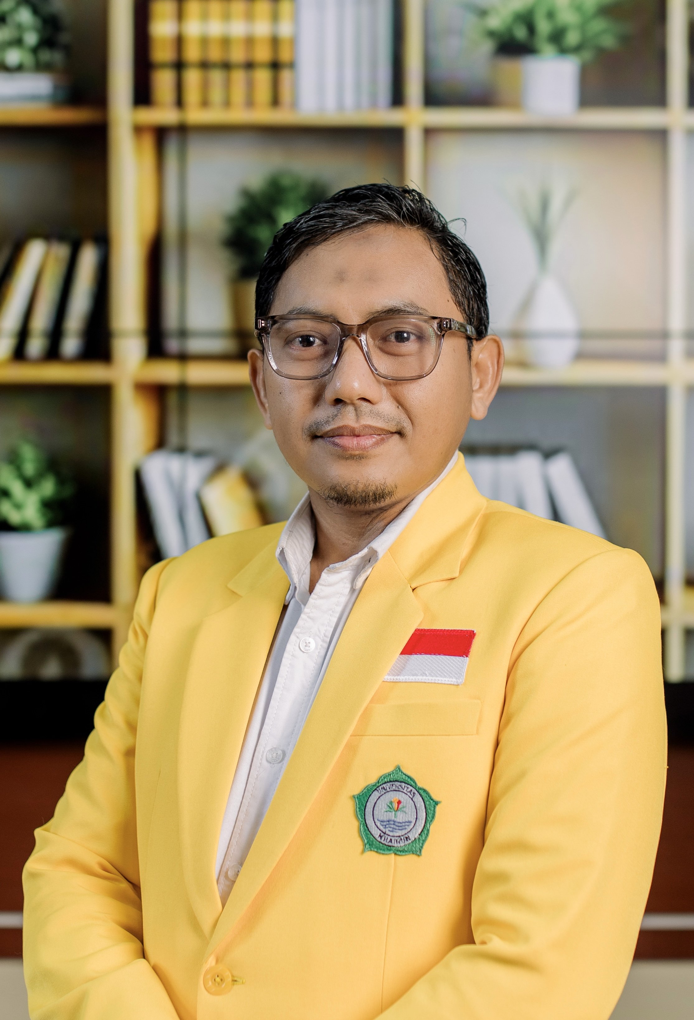 Dr. Rizal Rahman H. Teapon, SE., M.Si